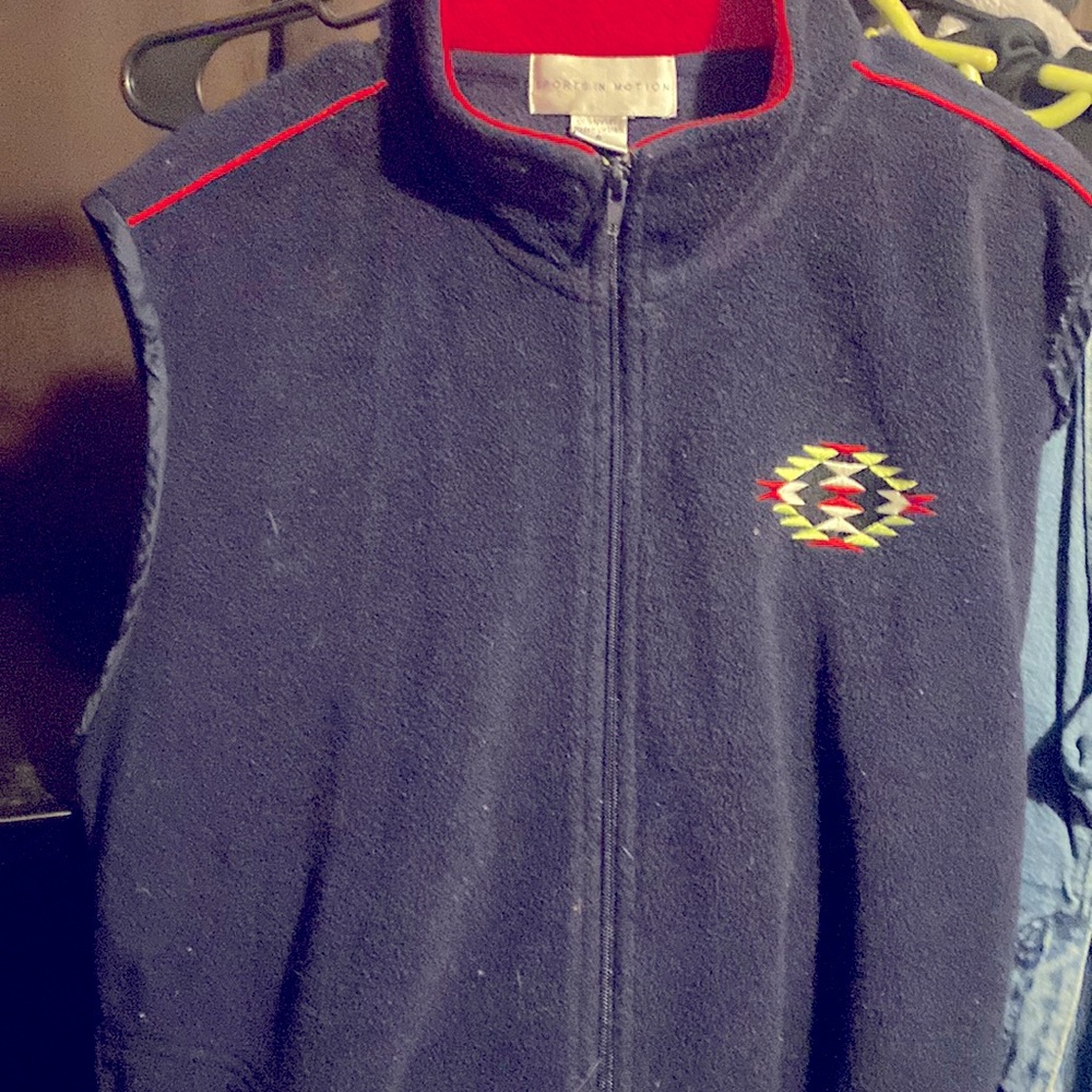 Size Small co/sex  custom embroidered fleece sports vest. SIM Sports in motion